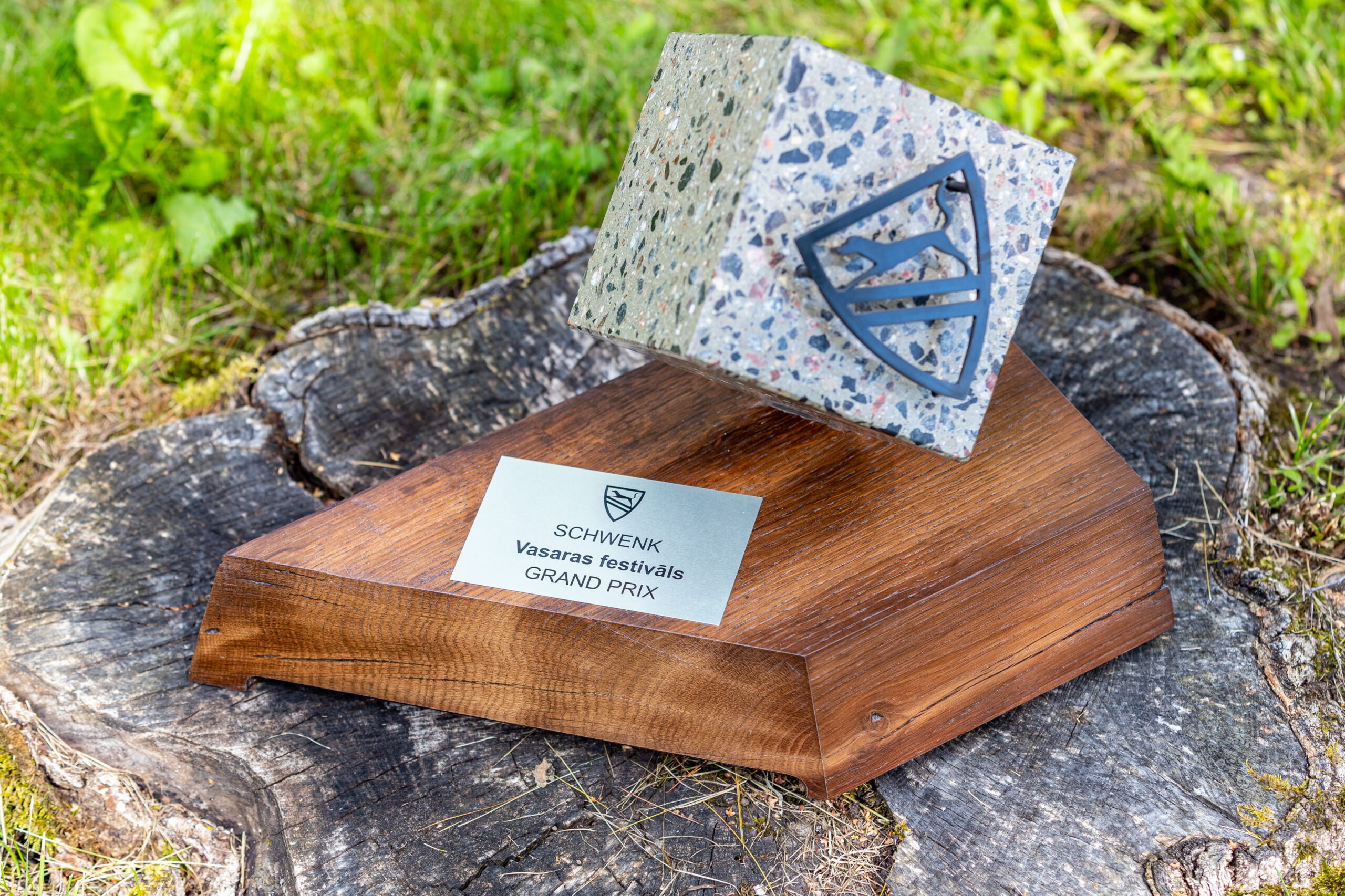 Prize - concrete cube on a wooden base